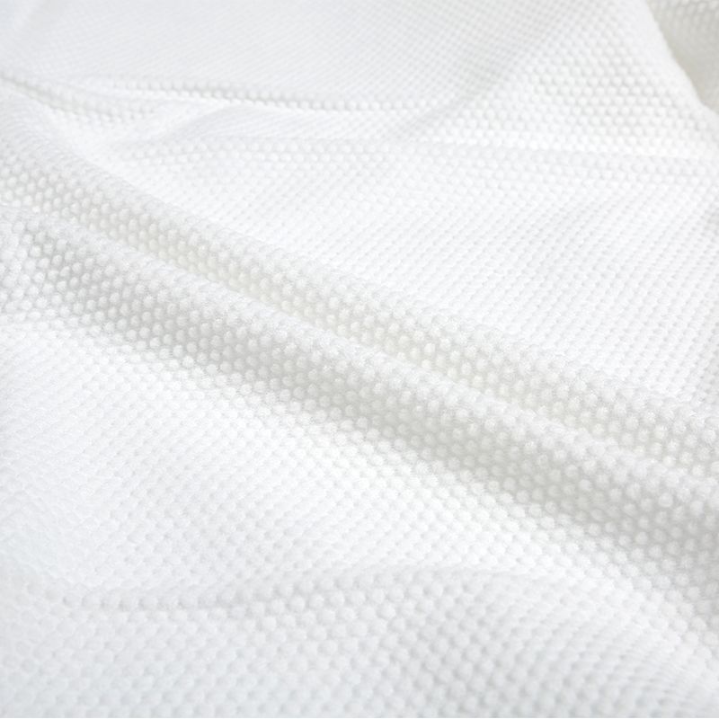 Präglad Small Dot Pearl Honeycomb Mönster Spunlace Nonwoven Tyg